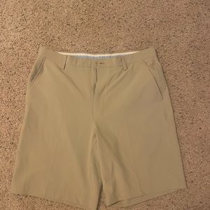 Lightly used kaki footjoy shorts . 36 waist